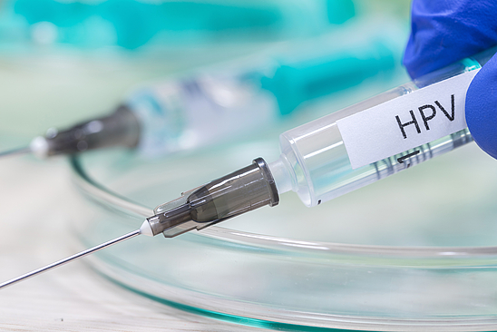 hpv vaccination syringe background